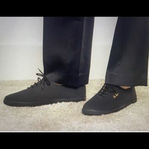 The Row black canvas sneakers